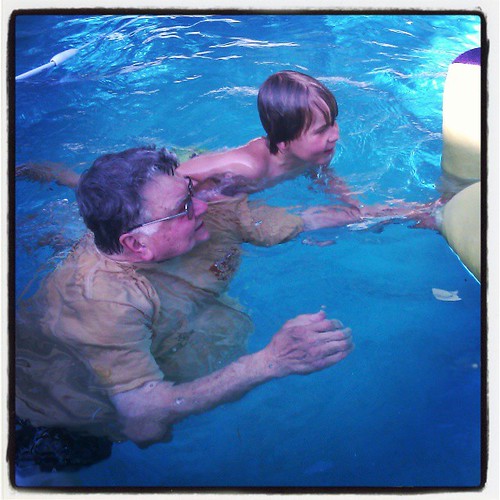 Asher swimming with Papa. This summer Asher can swim!!