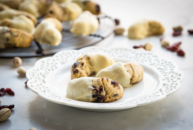 White Chocolate Dipped Pistachio Cranberry Crescent Cookies www.pineappleandcoconut.com