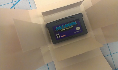 Game cartridge in opened box