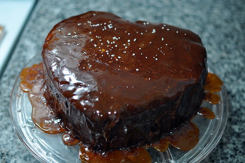 Heart-shaped chocolate caramel layer cake