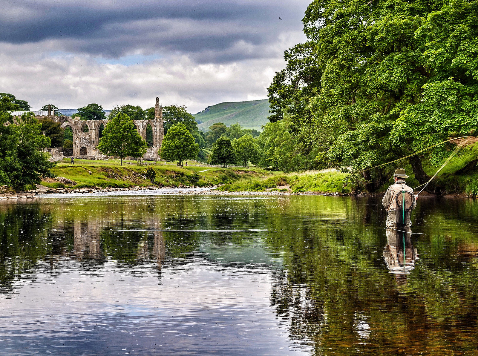 Fly Fishing in the River Wharfe next to Bolton Abbey, Wharfedale. Credit Carl Milner