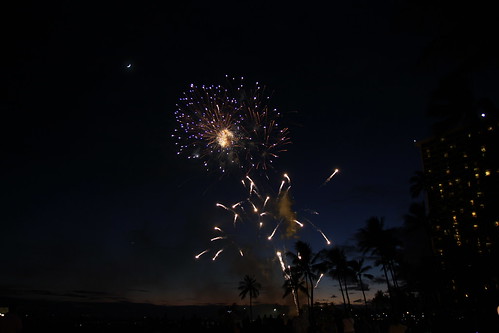 Fireworks under the moon at Hilton Hawaiian Village