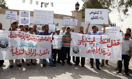 Oil workers protesting in Occupied Libyan capital of Tripoli. The oil industry has nearly ground to a halt from strikes. by Pan-African News Wire File Photos