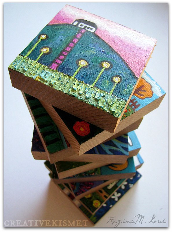 stacked little house paintings by Regina Lord