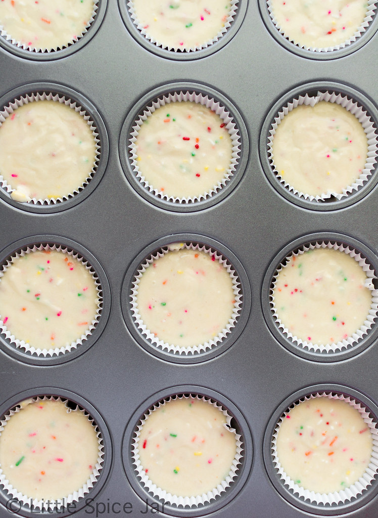 sprinkle cupcake batter in muffin pan lined with muffin liners before baking