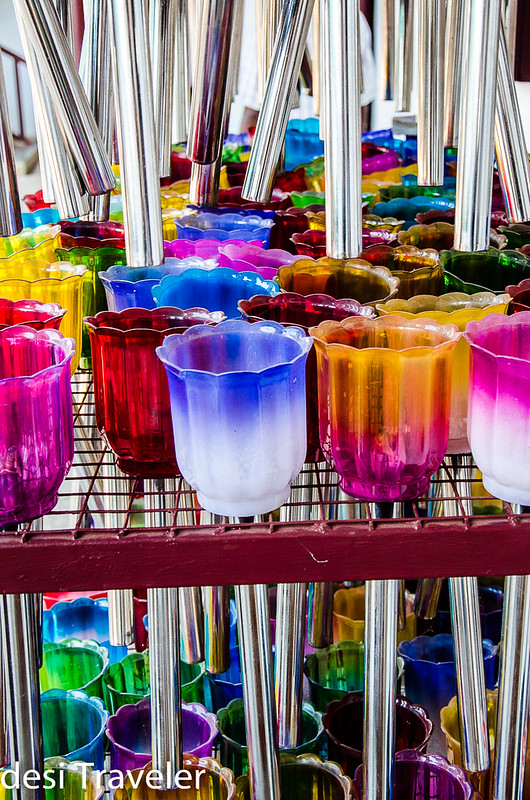 colorful candle holders in church
