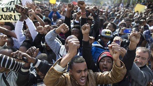 Tens of thousands of African migrants held a demonstration in Israel on January 5, 2014. The Africans are suffering from national discrimination and racist mob violence. by Pan-African News Wire File Photos