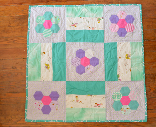 baby girl quilt with english paper piecing and posey fabric