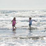Abbie and Jack frolicking in the waves