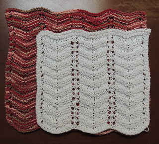 Two knitted dishcloths