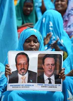 Poster held symbolizing the imperialist-backed conference in London to chart the future of the Horn of Africa nation of Somalia. The state has been a U.S. neo-colony under the current AMISOM and CIA occupation. by Pan-African News Wire File Photos