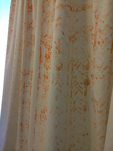 Painting the curtains with my two-year-old son