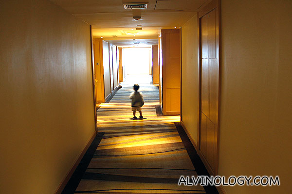 Asher exploring the rooms corridor