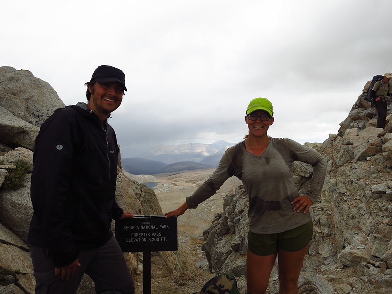 alice and russell atop forester pass with sign