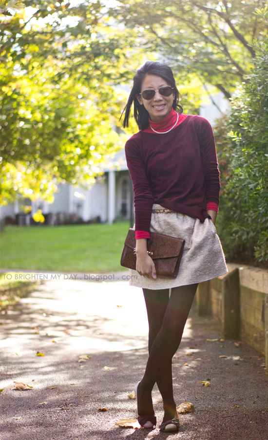 burgundy sweater, gold skirt