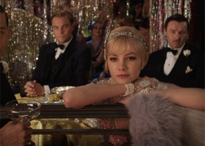 Tom and Gatsby flanking Carrie Mulligan as Daisy
