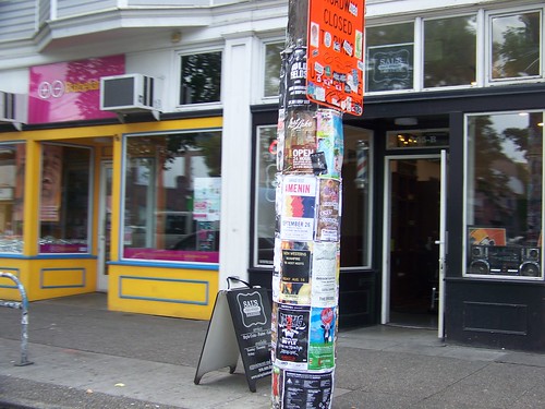 Telephone/utility pole in Seattle, plastered with posters
