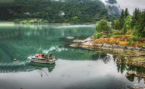 Emerald Reflection of a Fjord Cliff, Norway