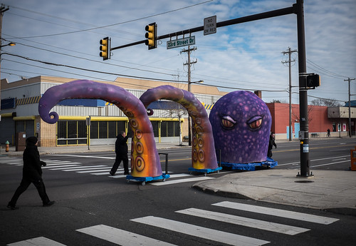 Members of the South Philly String Band move props up Oregon Ave.