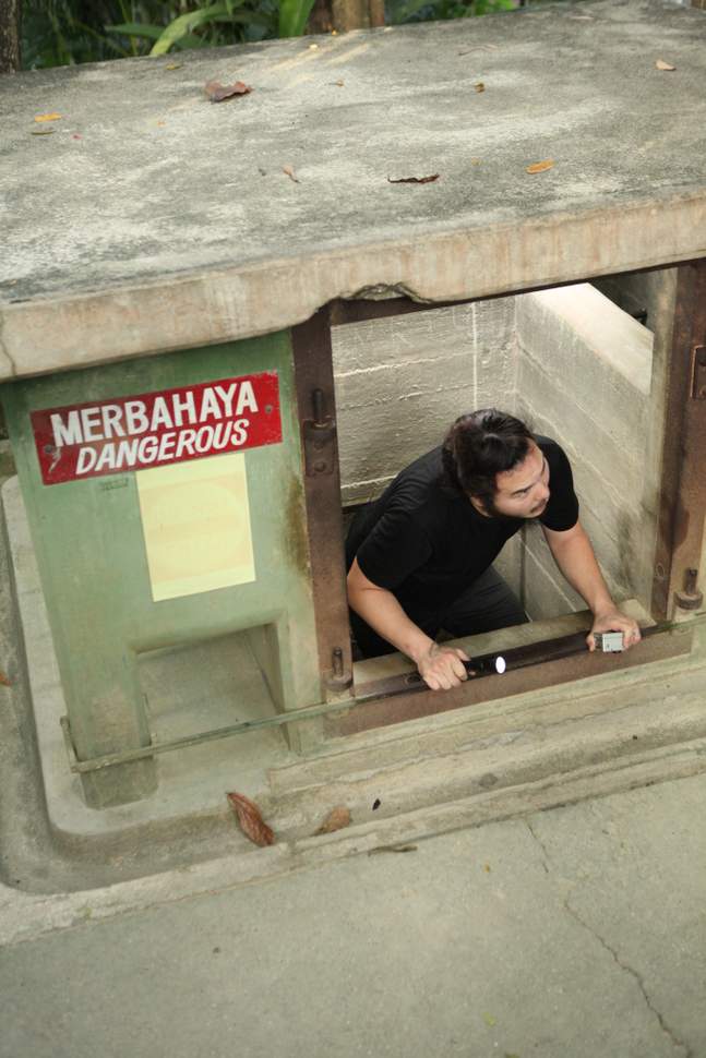 Rj Climbs Up An Escape Tunnel In Penang War Museum.