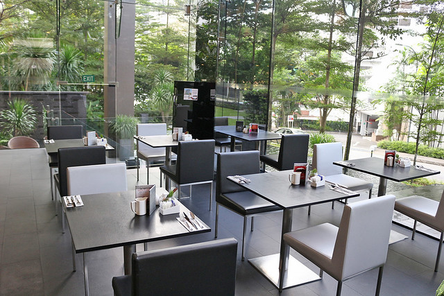 The dining area is really peaceful and relaxing, surrounded by greenery and water features