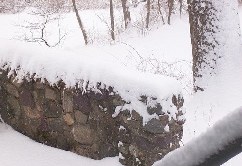 stone wall in snow