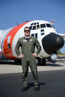 Lt. j.g. Matthew Chase is shown in front of an HC-130 Hercules airplane at Coast Guard Air Station Barbers Point in O'ahu, Hawaii July 31, 2013. Chase graduated from the Coast Guard Academy in 2011 and subsequently fulfilled his lifelong dream of becoming a Hercules pilot. (U.S. Coast Guard photo by Petty Officer 3rd Class Tara Molle) 