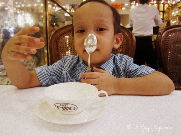 Little boy behavior during afternoon tea