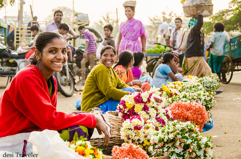 smiling girls selling flowers gudimalkapur