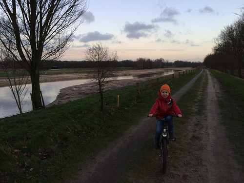 Scott riding his new bike along the Regge river in Ommen