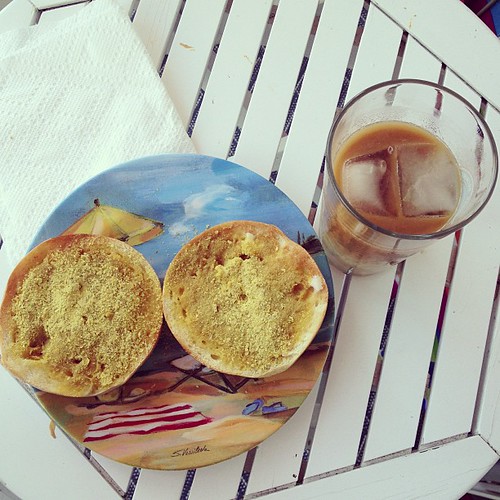 Beach House Breakfast: bagel, EB and nooch. Homemade cold brew coffee w. almond milk. #vegan