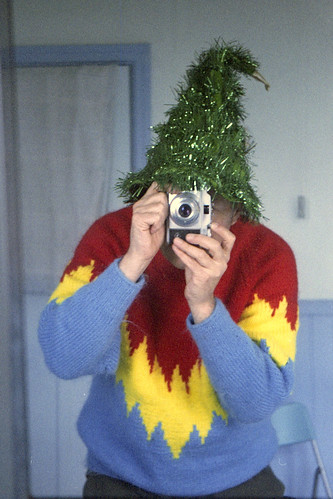 reflected self-portrait with Agfa Sillette camera and xmas tree hat by pho-Tony