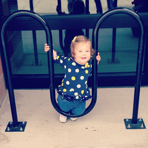 She had more fun with this bike rack than the actual playground. #easilyentertained