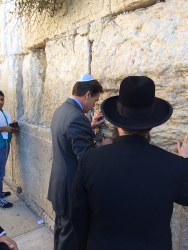 Governor Perry praying at the Western Wall.