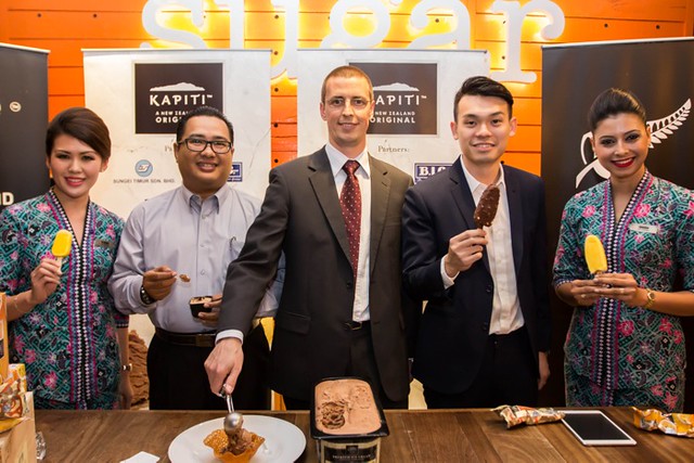 Launch of Kapiti Ice Cream - En Shamsul Amree from MAS, Mr Matt Ritche New Zealand Trade Commissioner and Mr Darren Tan from Sungei Timur flanked by MAS stewardesses