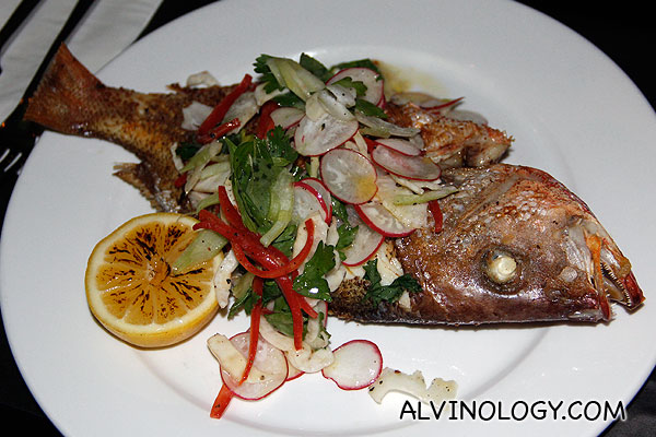 Whole roasted snapper (Crusted with cumin and fennel seeds served with herb salad) - S$27