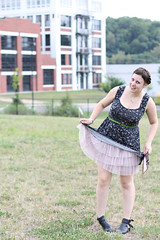 Petticoat outfit: Black open-back Urban Outfitters dress with pink rosebud print, pink tutu skirt, black "Everly" openwork Jeffrey Campbell ankle boots, green leather belt, metallic rose Marc by Marc Jacobs for Target pouch clutch
