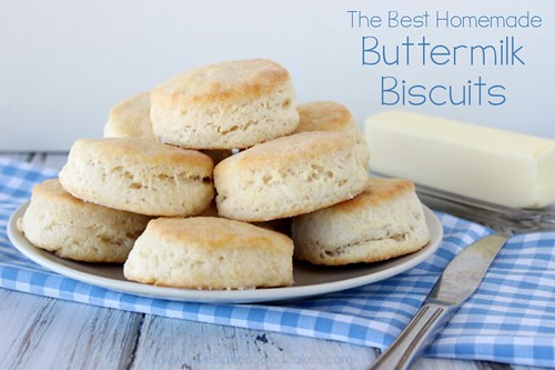 The BEST Homemade Buttermilk Biscuits stacked up on a plate close up.