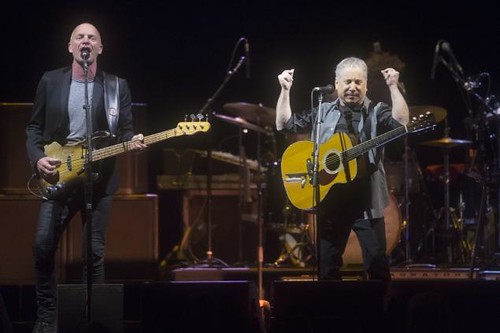 sting and paul simon onstage