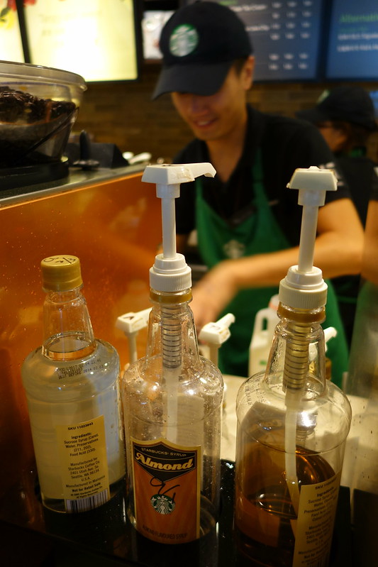 starbucks worker with smile