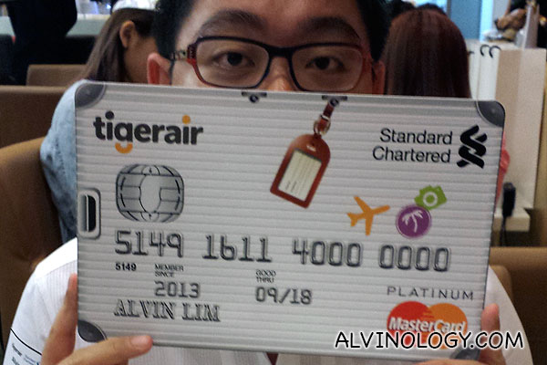 Me with my new giant-size Standard Chartered Tigerair Platinum credit card
