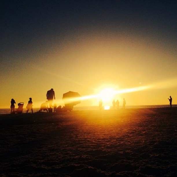 People behind us on the beach took this photo of our family and then offered to text it to us. #siestakey #sunset