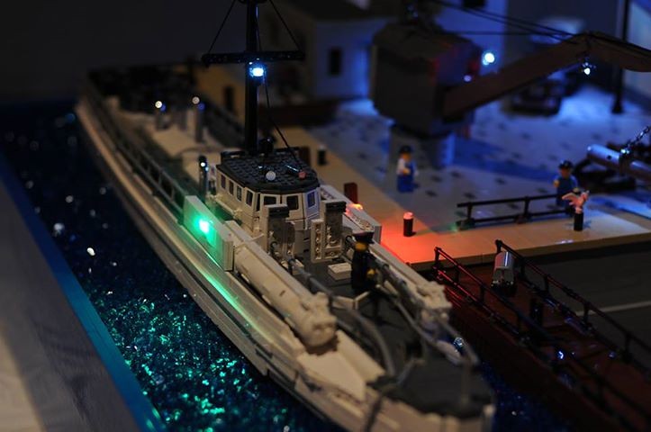 Stunning LEGO photo - Lego Schnellboot docked at night. Photo courtesy of Jim Liermann