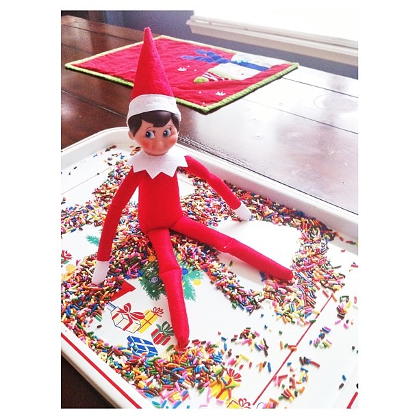 Snowflake misses the snow. So, he found whatever he could to make snow angels. Sprinkles. :: My son thinks its weird he's going through our stuff. ☺ :: #jbelfontheshelf #elfontheshelf #elftakeover