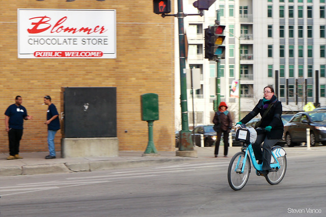 Woman using a Divvy bike