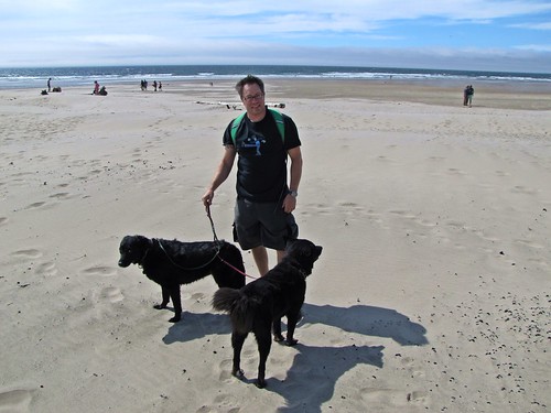 Josh and pets on beach