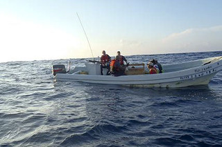 Coast Guard crew members take control of a Mexican lancha caught fishing illegally in U.S. waters, Nov. 20, 2013. The catch was disposed of at sea and the four fishermen were transferred to U.S. Customs and Border Protection. U.S. Coast Guard photo..