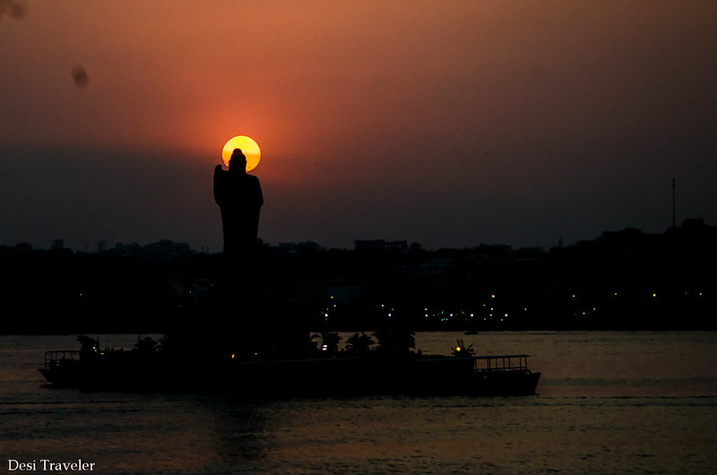 The Sun Forming an Aura Hussain Sagar 18 meters tall Buddha Statue 