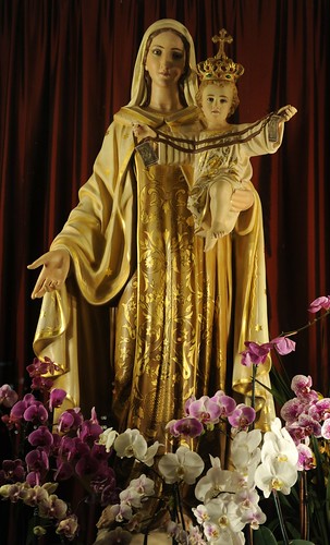 Mother Mary holding baby Jesus, Christ the King with a rosary, crown, golden floral garments, flowers, Our Lady of Peace Church and Shrine, Santa Clara, California, USA by Wonderlane