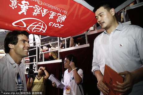 July 1st, 2013 - Brazilian soccer star Kaka talks to Yao at the Yao Foundation charity game in Beijing